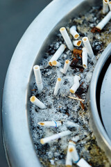 cigarette butts in ashtray © mnimage