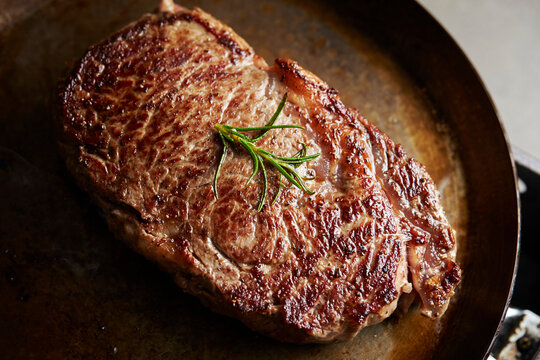 Beef steak in an iron pan