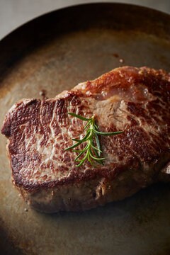 Beef steak in an iron pan