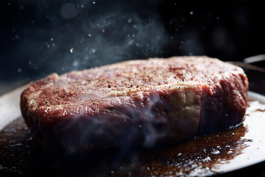 Beef steak in an iron pan