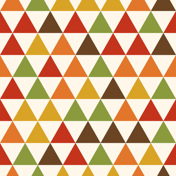 Seamless autumn uroko fish scale pattern, traditional Japanese triangle geometric background in warm fall colors