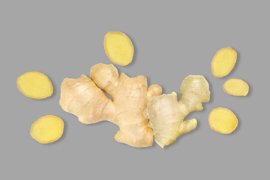 Ginger root displayed on grey surface highlighting its unique shape