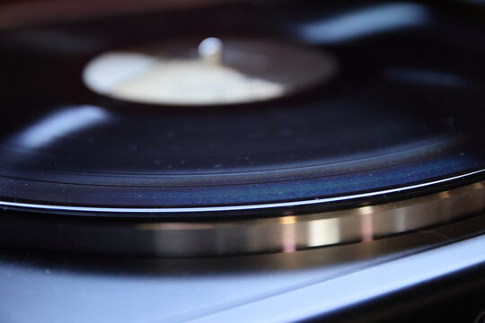 Close-Up of Grooves on Spinning Vinyl Record