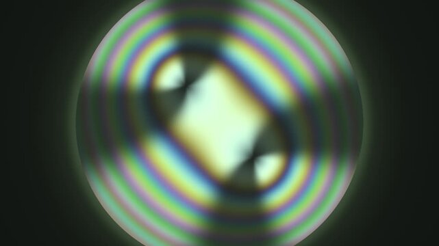 Conoscopic Interference Figure With Swinging Isogyre Brushes In Polarized Light Seamless Loop in vibrant green tones