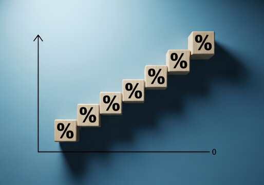 Staircase of wooden blocks featuring percent signs climbing up chart axis representing economic growth and positive market trend.
