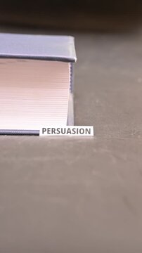 Persuasion Word on Paper Between Book Pages Convincing Strategy Concept