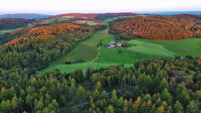 Aerial Drone View of Rural Valley, Forests, and Fields at Sunset