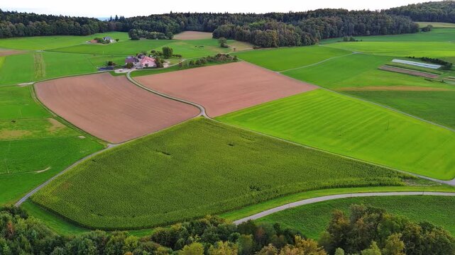 Aerial Drone View Over Colorful Patchwork of Agricultural Fields and Farmland