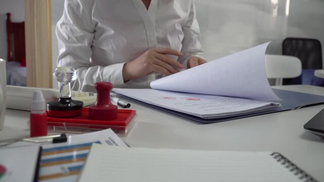 The businessman signed and stamped the contract