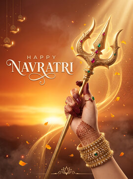 A hand holding a golden trident against a glowing sunset background