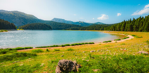 Obraz premium Black Lake (Crno Jezero) with the majestic Medjed peak in the background, Durmitor National Park, Montenegro.