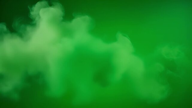 Green smoke wafting and swirling in cinematic motion against a dark backdrop
