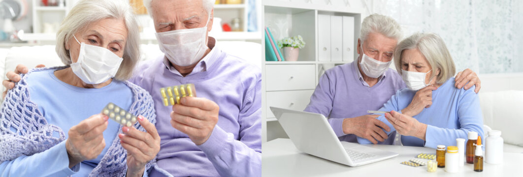 Senior couple wearing face masks holding medication blister packs and consulting online