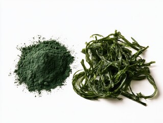 Naklejka premium A pile of green spirulina powder next to a cluster of fresh green seaweed isolated on white background