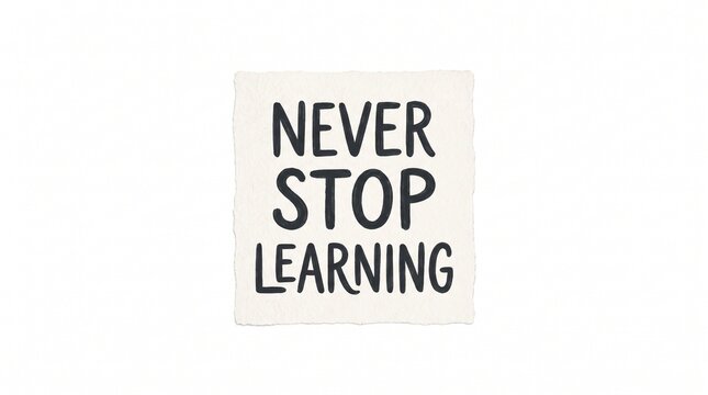 Never Stop Learning Motivational Message on a Sticky Note.