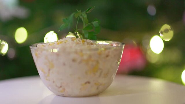 Creamy Salad Dish with Parsley Garnish and Festive Bokeh Background