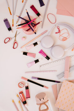 Top View Pink Art Supplies Composition On White Background
