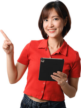 Happy asian woman pointing finger up holding digital tablet wearing casual red shirt presenting idea with cheerful smile transparency