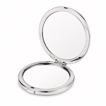 Open silver compact mirror on white background