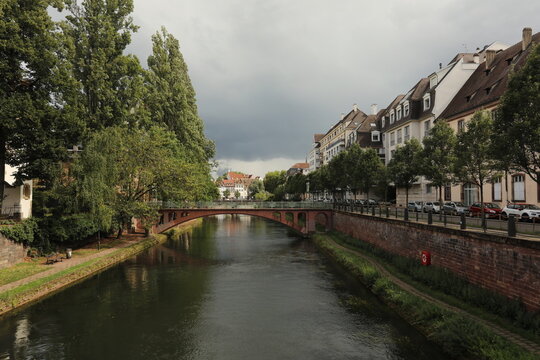 Scenic canal bridge and historic buildings in Strasbourg, France