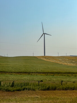 Wind turbines on Saskatchewan prairie farmland, Canada