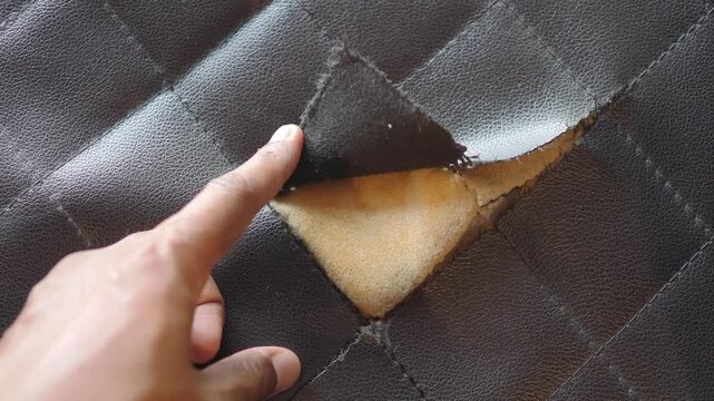 Fixing a tear in leather material at home