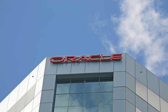 Oracle company sign on building facade in Brisbane