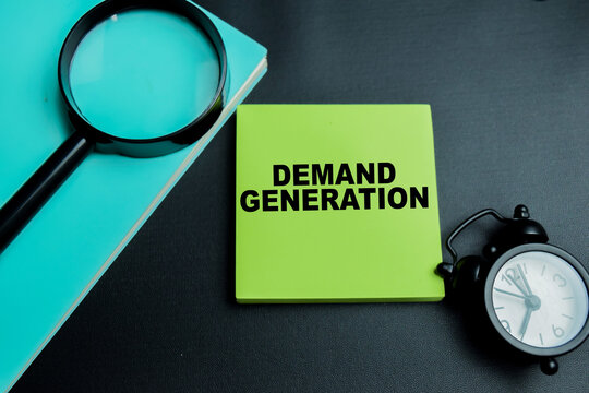 Concept of demand generation write on sticky notes isolated on table.