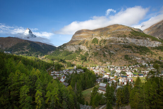 Matterhorn snow peak and alpine village panorama, Switzerland