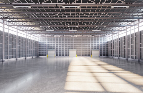 Empty factory interior filled with natural light