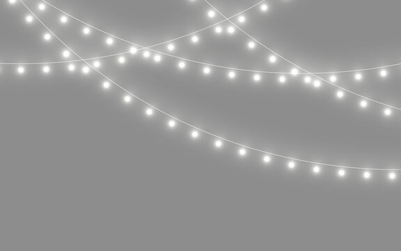 Christmas lights PNG on transparent background with golden bulbs. Soft glow adds elegance. Perfect for holiday cards and web projects.