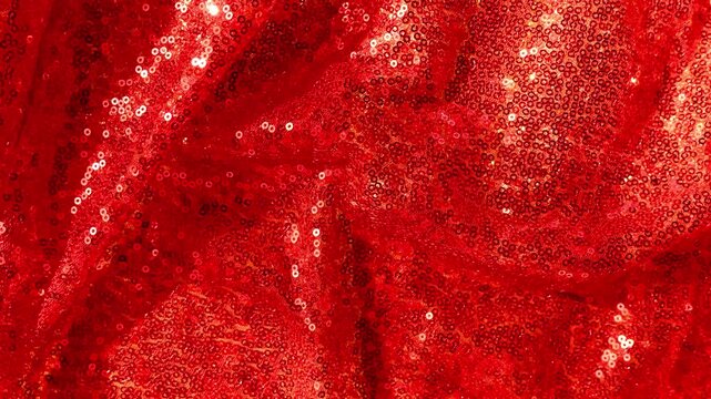 red shimmer celebration background.red sequin fabric folds. 4k footage