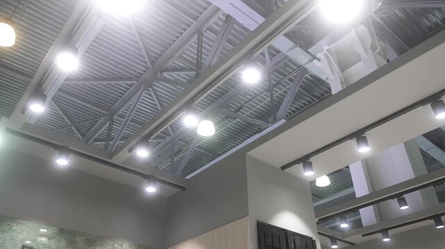 Modern industrial showroom ceiling with exposed steel trusses and illuminated track lighting, with ceiling, interior, industrial, steel detail, showing truss, metal, corrugated, roof context