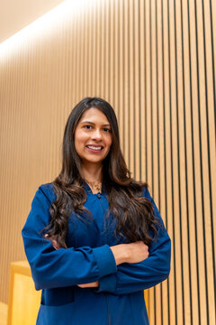Professional woman smiling in aesthetic clinic atmosphere