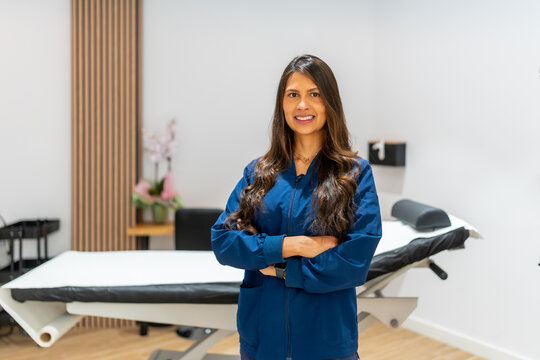 Female professional smiling in beauty aesthetic clinic