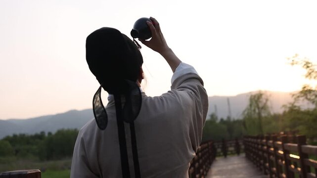 In ancient times, people would drink outdoors while enjoying the mountains and waters