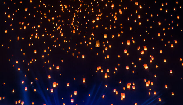 Tourist floating sky lanterns in Loy Krathong festival , Chiang Mai ,Thailand.