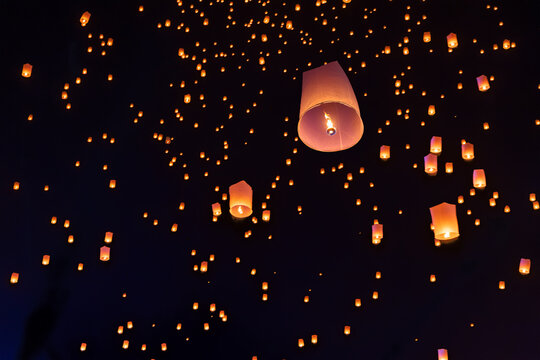 Tourist floating sky lanterns in Loy Krathong festival , Chiang Mai ,Thailand.