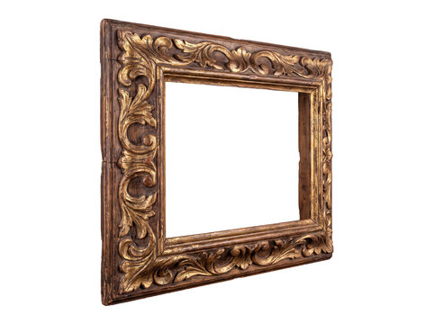 Ornate antique wooden picture frame with detailed gold-leaf carving, viewed from an angle on a transparent background.
