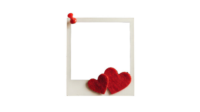 Instant film frame with red felt hearts and pushpin isolated on transparent background