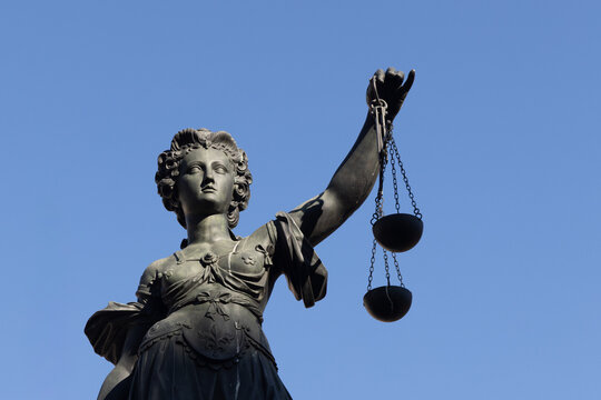 Lady Justice statue at Frankfurt R&ouml;mer square as symbol for Justice