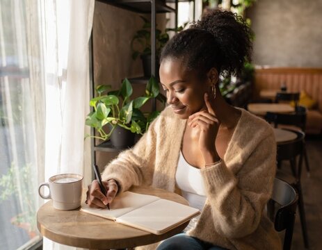 Woman writing notebook