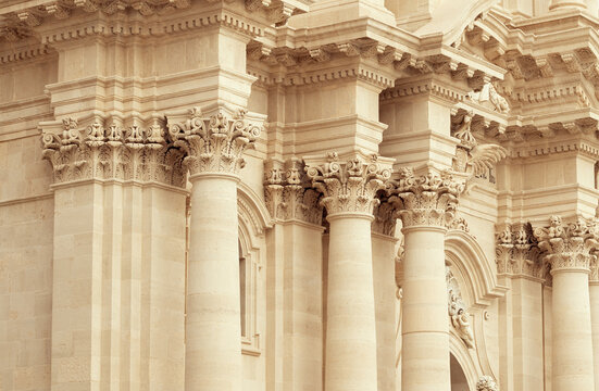 Majestic ancient Greek temple colonnade with intricate Corinthian capitals and ornate frieze