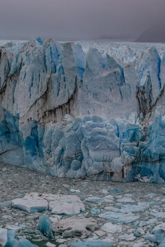 Perito Moreno Dramatic view of a glacier calving ice into cold arctic waters during a global warming event