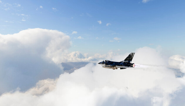 A military fighter jet flying through clouds with afterburner blazing
