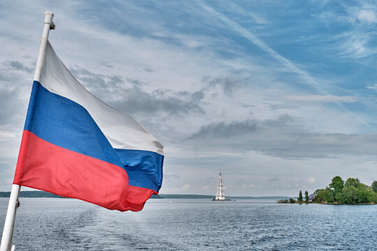 Russian Flag Waving with Flooded Kalyazin Bell Tower in Background