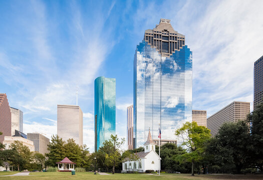 USA, Texas, Houston, Sam Houston Park, St. John's Church and skyline