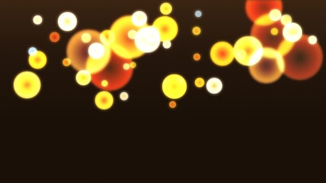Bokeh circles in warm tones on dark background. 2d animation