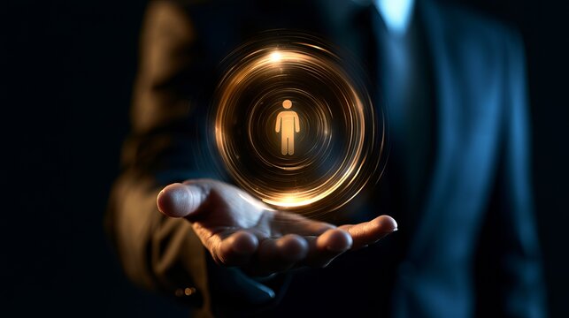 Man in dark suit presenting a glowing digital silhouette within a circular form, showcasing futuristic technology and representing human data within a network