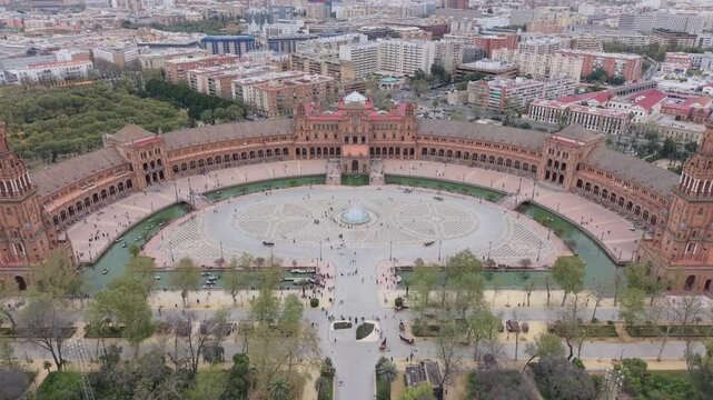 Aerial top view of a monumental circular plaza and canal